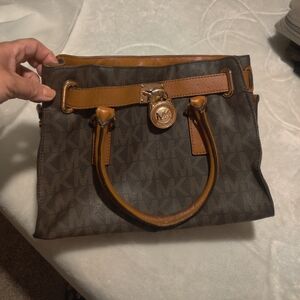 Michael Kors Black and Brown Satchel with Signature Design